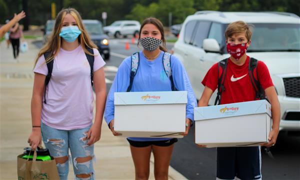students smile on first day of school